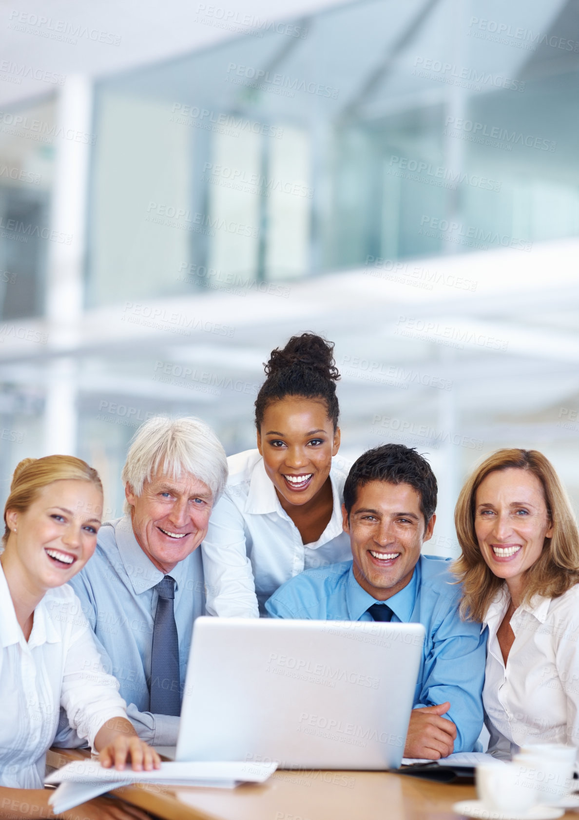 Buy stock photo Portrait of successful multi ethnic business people working together on laptop