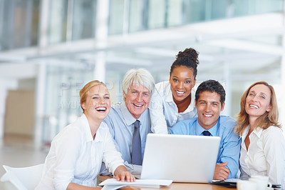 Buy stock photo Portrait of happy business people working together on laptop