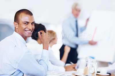 Buy stock photo Portrait of African American business man smiling with executives attending presentation