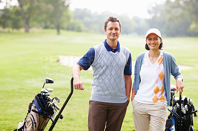 Buy stock photo Portrait of couple standing on golf course and smiling