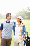 Couple ready for a game of golf