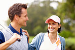 Attractive golfing couple