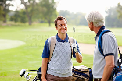 Buy stock photo Father, son and happy on course for golf, sports and bonding outdoor with equipment bag or conversation. Elderly person, man and smile on grass for hobby, talking and playing game at country club