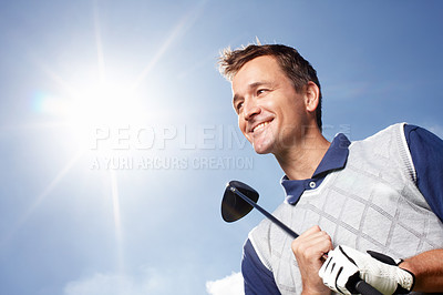 Buy stock photo Sports, thinking and man in golf course for playing, training and practice for tournament game. Country club, male person or golfer with kit for championship match, coordination and smile by blue sky