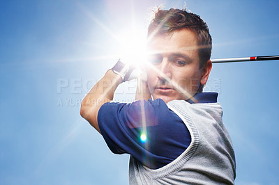 Buy stock photo Sports, golf course and man with swinging for match, training and practice for tournament game. Country club, male person or golfer with skills for championship, coordination and playing by blue sky