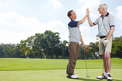 Buy stock photo Game, high five and men on golf course together for teamwork, outdoor fun and happy competition at club. Sports, senior father and son on green with motivation, bonding and support for partnership