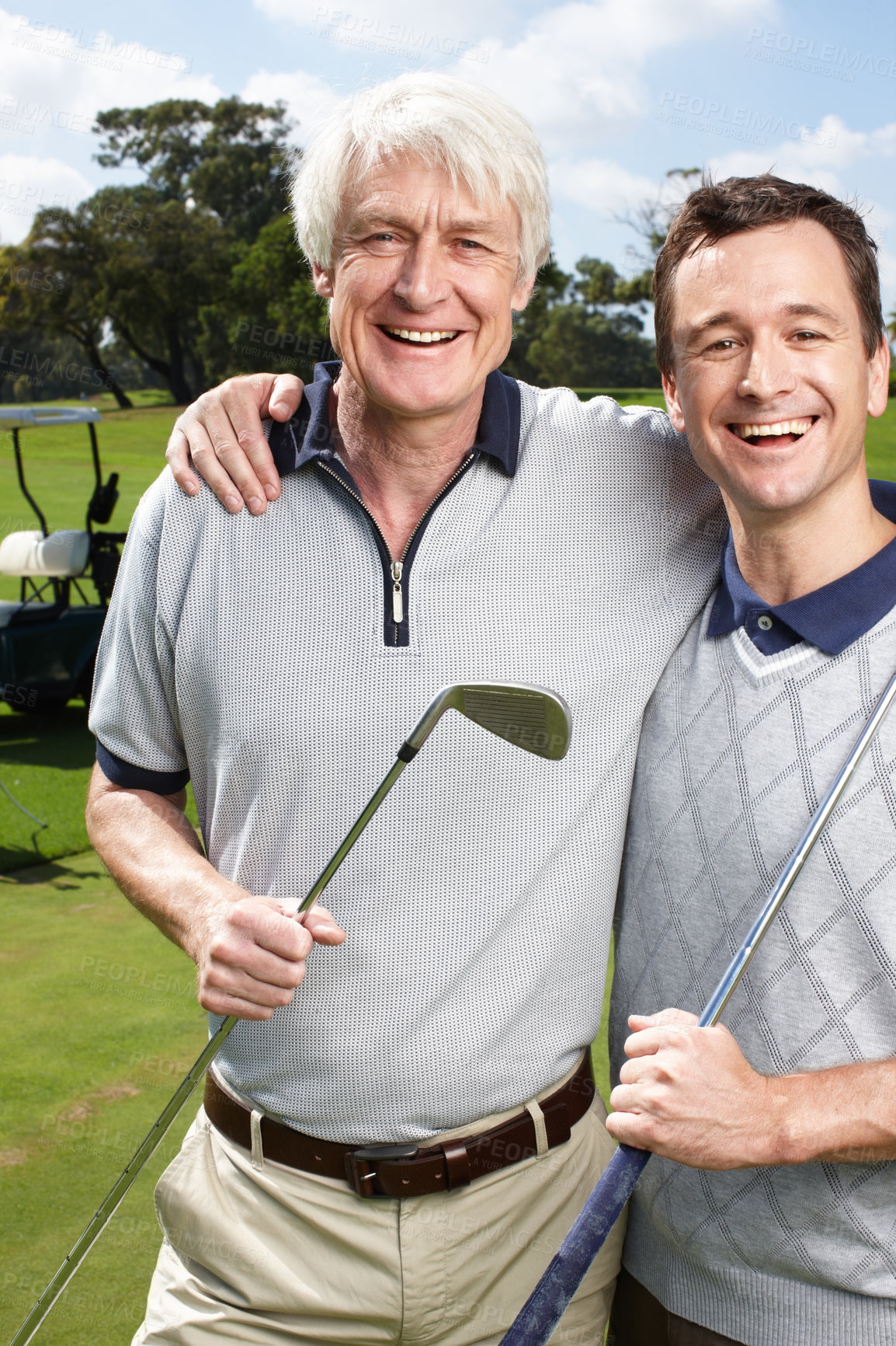 Buy stock photo Portrait, golf course and father with son, club and hug with fitness, recreation and health. Face, family or people with smile, embrace and happiness with training, routine and hobby with vacation