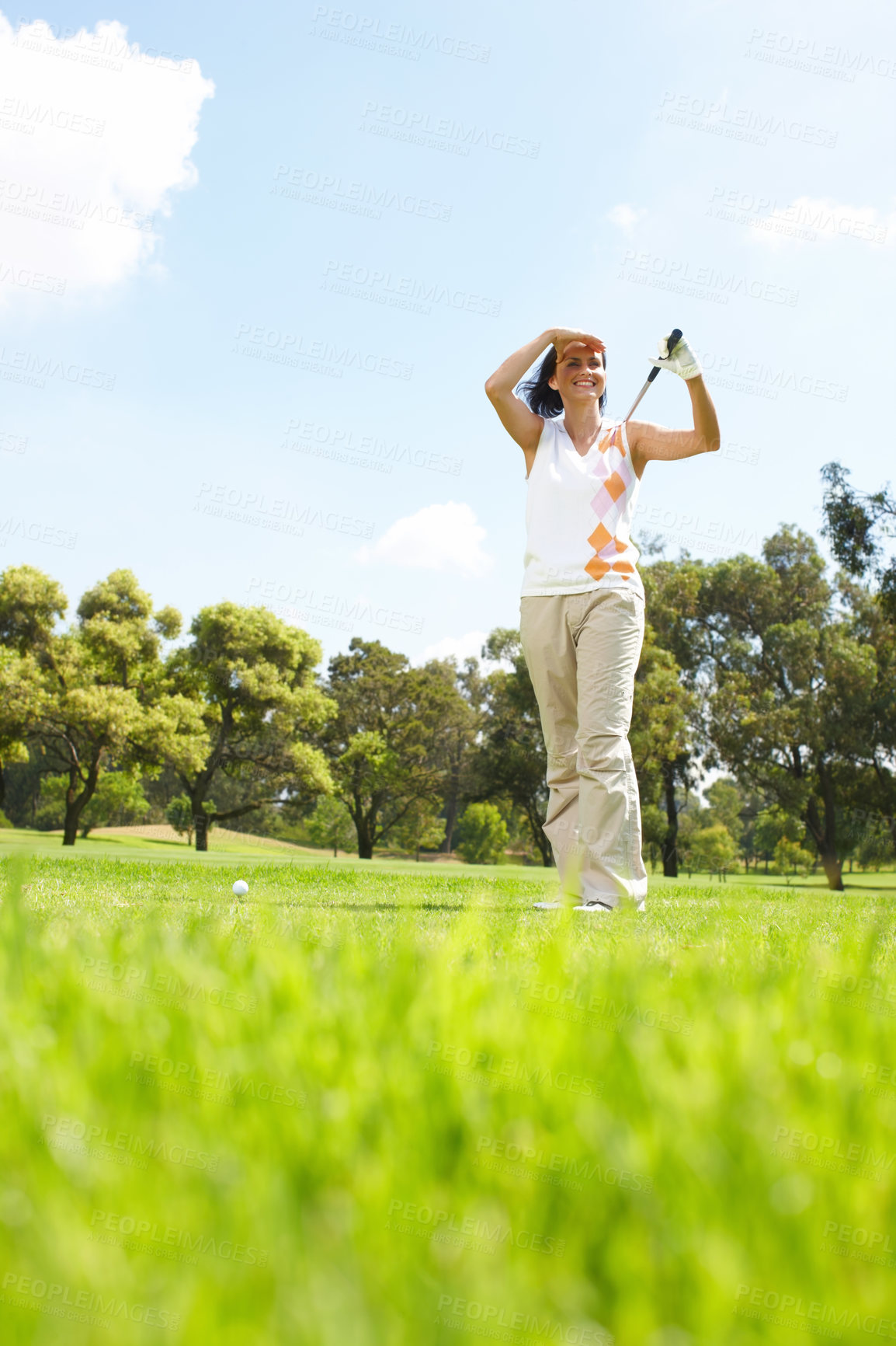 Buy stock photo Smile, checking and woman on golf course with club for outdoor exercise, fitness and challenge in morning. Sports, swing and female golfer on green grass for competition, relax and fun game in nature