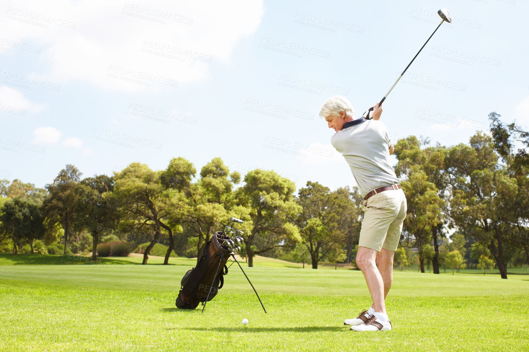 Buy stock photo Old man, swing and golf course for sports, club and outdoor fitness for competition or games. Male person, tournament and precision for practice match on turf, exercise and challenge in retirement