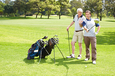 Buy stock photo Advice, play and men on golf course together for teamwork, outdoor fun and fitness competition in nature. Sports, senior father and son on green for partnership, bonding and support in club challenge