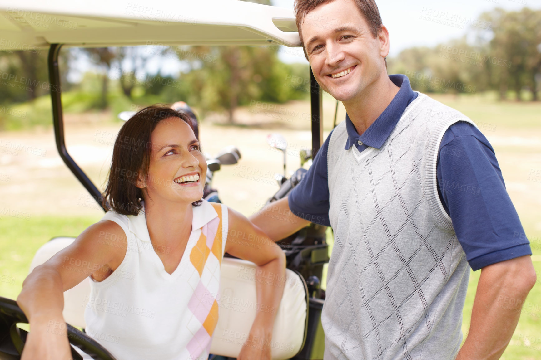 Buy stock photo Smile, portrait and couple in golf cart for game, outdoor bonding and fitness on weekend morning together. Love, happy woman and man in buggy for sports transport, health or wellness for fun exercise