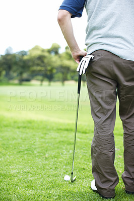 Buy stock photo Cropped view of a man playing golf on the course
