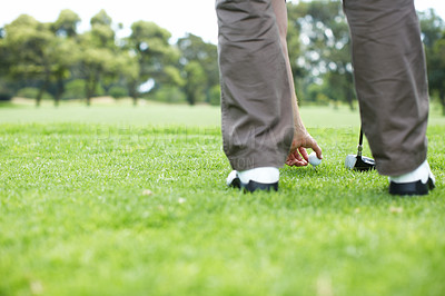 Buy stock photo Cropped view of a man playing golf on the course