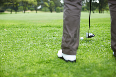 Buy stock photo Cropped view of a man playing golf on the course