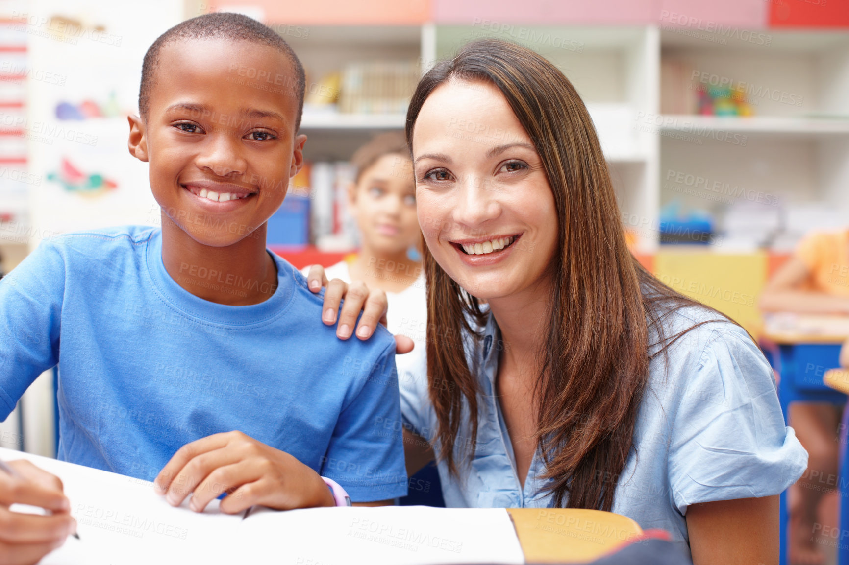 Buy stock photo Education, classroom and portrait of teacher with child for help with quiz for learning, knowledge and development. School, student and woman with boy for teaching, test and check answers in lesson