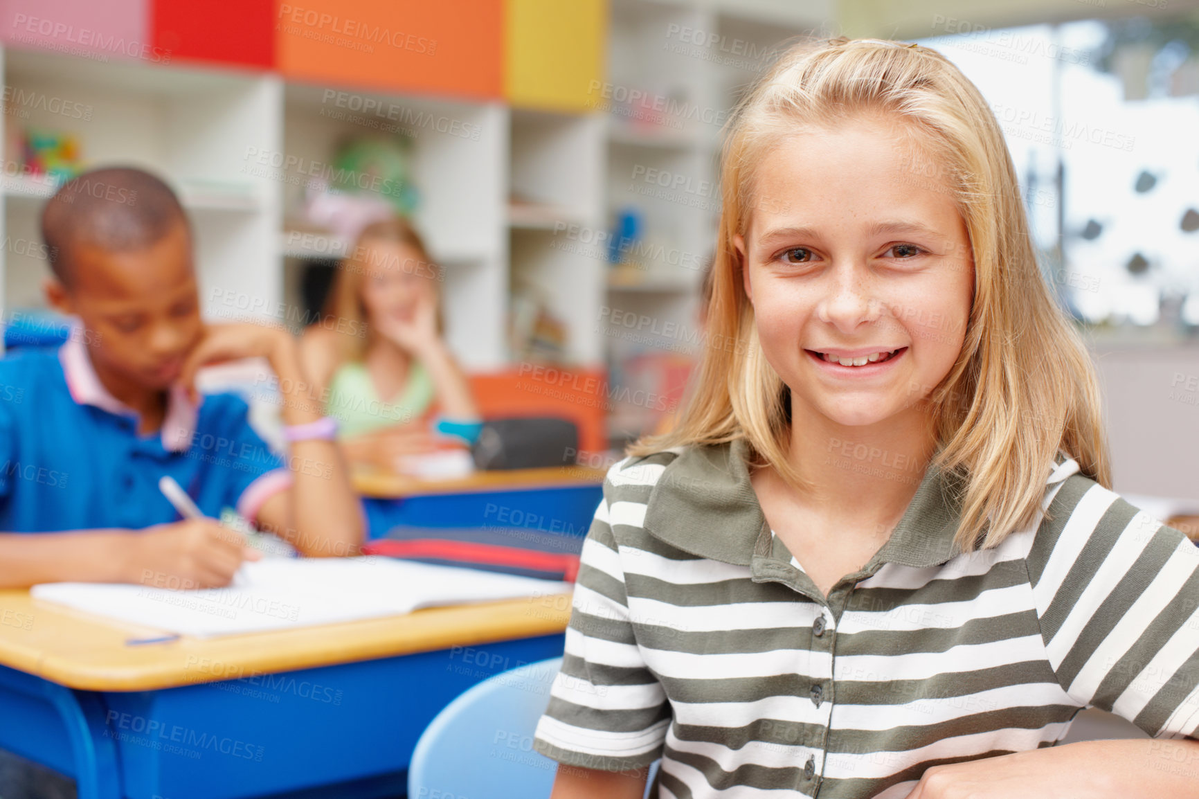 Buy stock photo Smile, confidence and portrait of girl in classroom for learning, growth and child development at school. Happy, face and student at desk for education, study and future opportunity for scholarship.