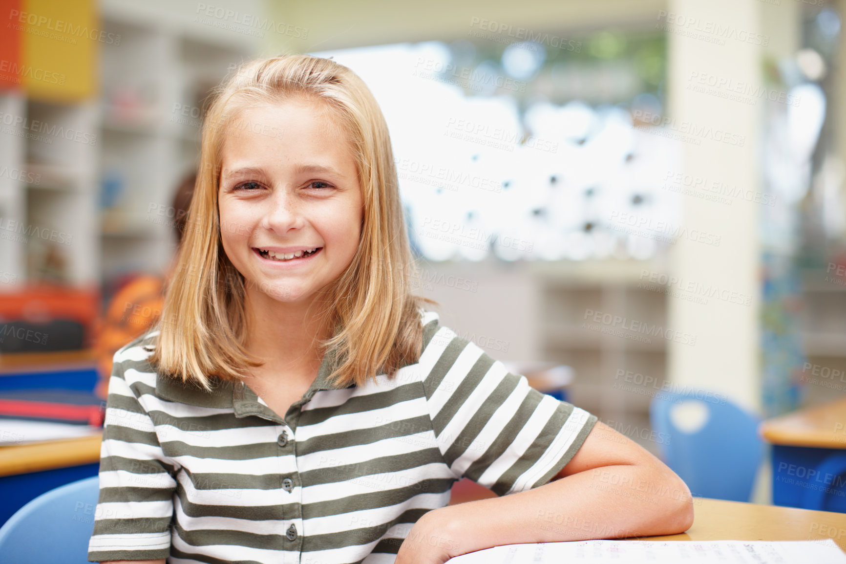 Buy stock photo Happy, confidence and portrait of girl in classroom for learning, growth and child development at school. Smile, face and student at desk for education, study and future opportunity for scholarship.