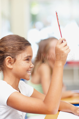 Buy stock photo Question, girl and answer in classroom for education, assessment and learning scholarship with smile. Smart student, lesson and hands raised with knowledge, exam test or feedback at elementary school