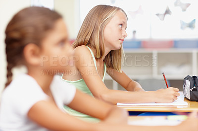 Buy stock photo Student, girl and thinking in classroom for exam answer at school for education, ideas and learning. Learner, kid and thoughts for assessment in elementary phase for brain development and child growth