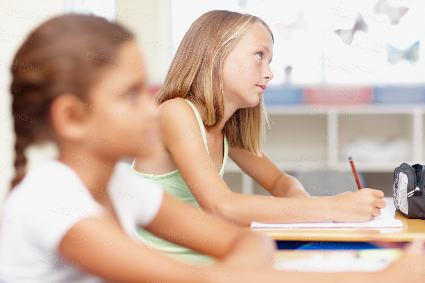 Buy stock photo Student, girl and thinking in classroom for exam answer at school for education, ideas and learning. Learner, kid and thoughts for assessment in elementary phase for brain development and child growth