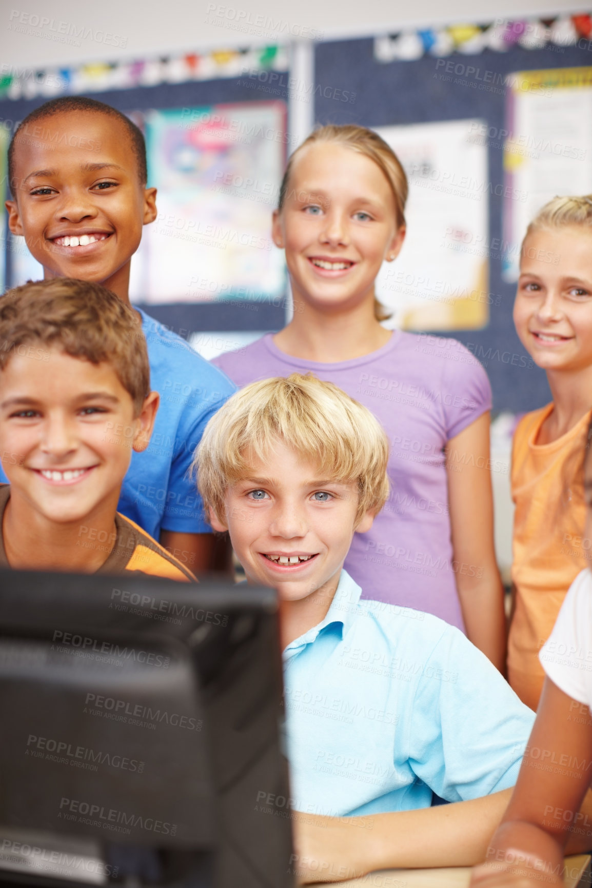 Buy stock photo Education, students and portrait at computer in classroom for online reading, elearning platform or scholarship. Children, smile and studying on tech at school for knowledge development or group quiz