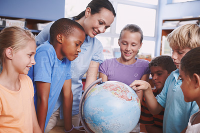 Buy stock photo World map, teacher and kids in classroom, globe and conversation with knowledge, excited and talking. Geography, woman and students in school, children or studying with happiness, answer and learning