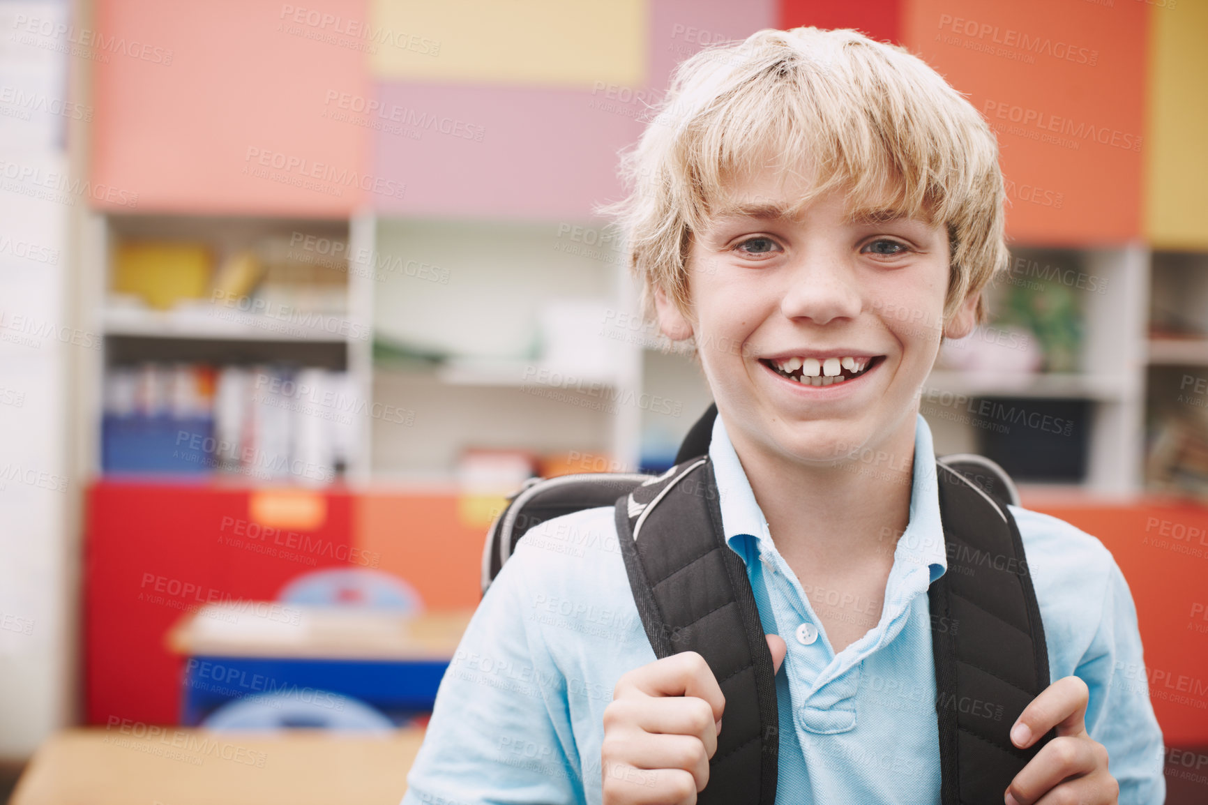 Buy stock photo Smile, portrait and boy in classroom for education, learning and ready for morning kindergarten. Happy, school and child student with backpack for knowledge, studying and pride for academic lesson