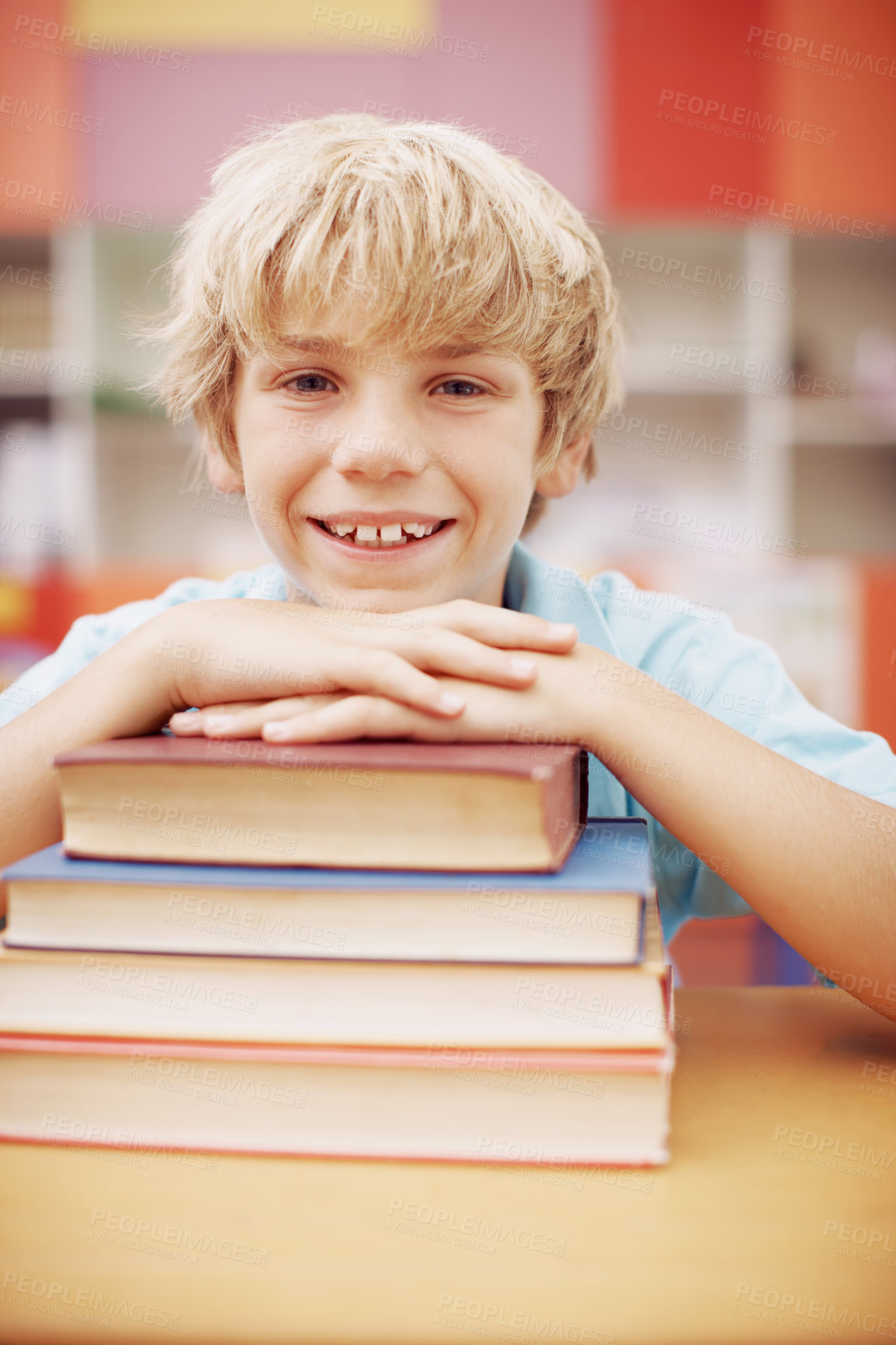 Buy stock photo Books, education and portrait of boy student in classroom of school for child development, future or growth. Face, learning or study and happy kid in class for lesson, reading or scholarship