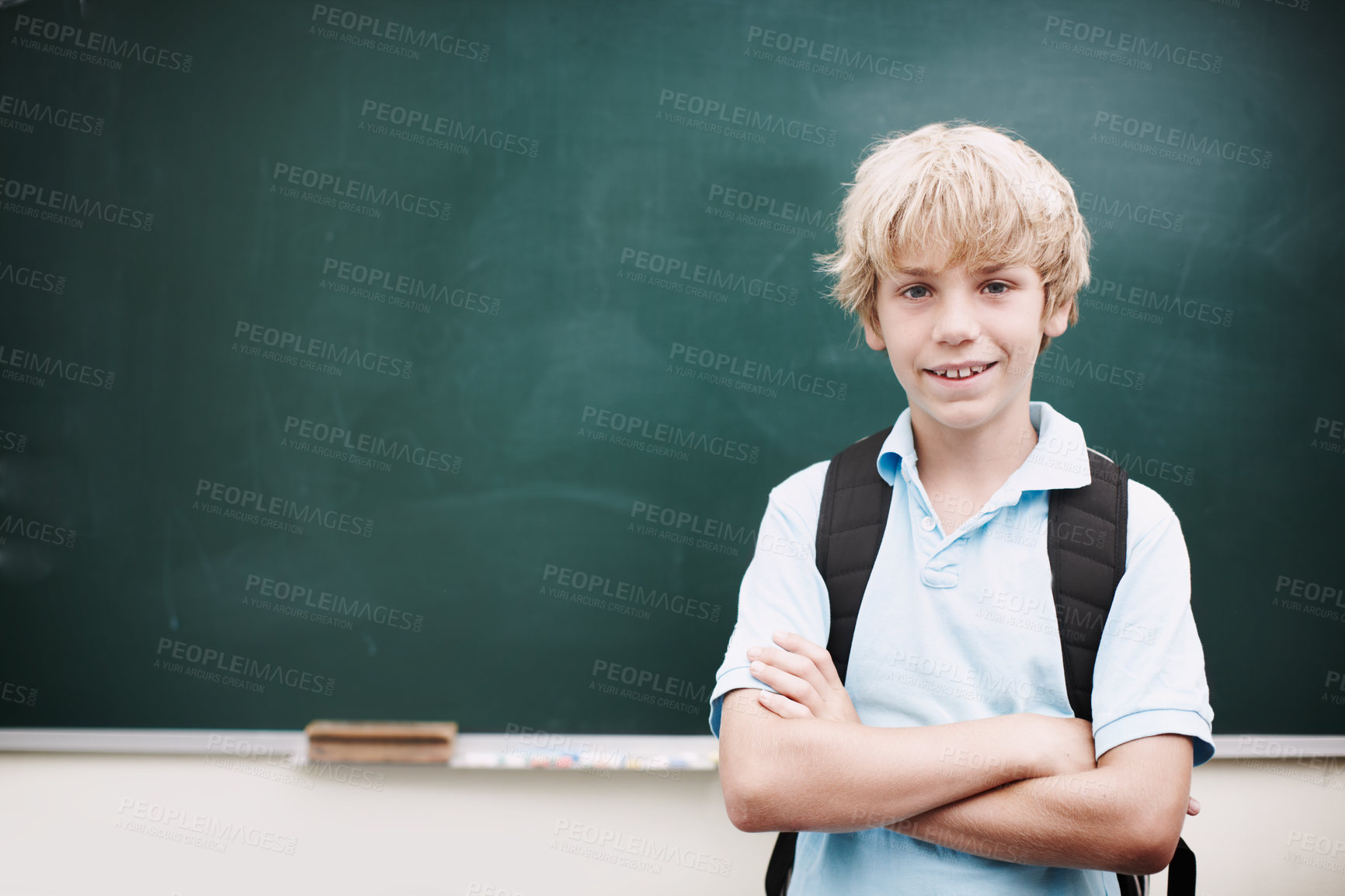 Buy stock photo Arms crossed, chalkboard and portrait of boy in classroom at school for development or education. Learning, smile and study with student on mockup space in class for future, growth or scholarship