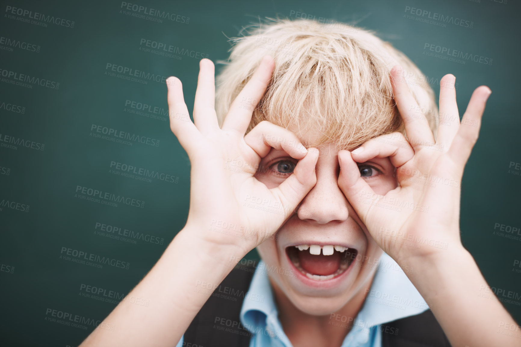 Buy stock photo Chalkboard, finger glasses and portrait of boy in classroom at school for development or education. Learning, smile and study with excited student in academic class for future, growth or scholarship