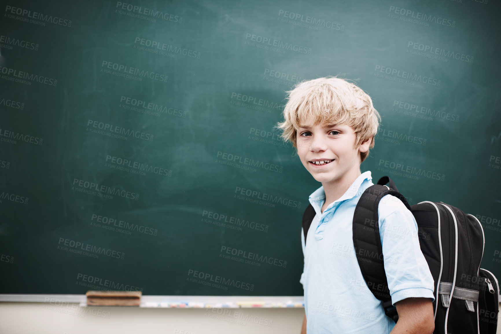 Buy stock photo Chalkboard, education and portrait of boy in classroom at school for development with backpack. Learning, smile and study with happy student on mockup space in class for future, growth or scholarship