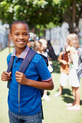 Buy stock photo Smiling african-american boy wearing his school backpack posing outside  - copyspace