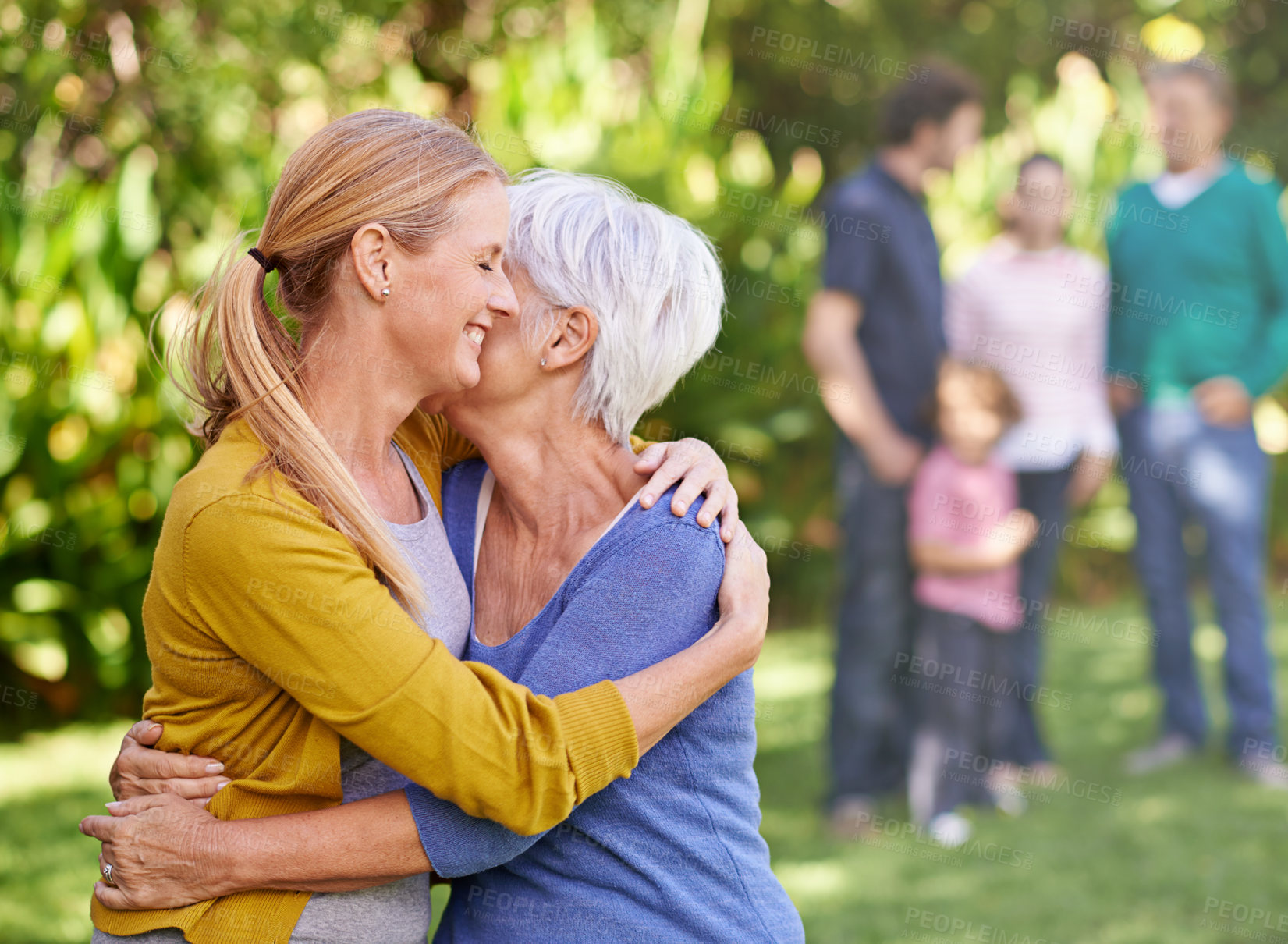 Buy stock photo Hug, family and women with love for bonding, affection and embrace to relax in garden, backyard and nature. Female people, mother and daughter with smile, happiness or together outdoor with relatives