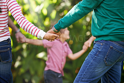 Buy stock photo Family, holding hands and kids dance in garden or play game in summer together in a circle at park. Ring a rosy, round and children outdoor on holiday, vacation and bonding with parents in nature