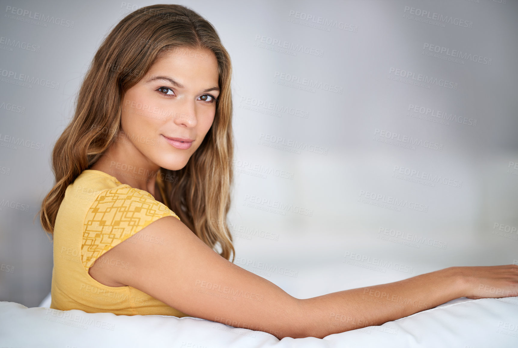 Buy stock photo Confidence, portrait and woman couch to relax in house or home for comfort in living room for satisfaction. Face, peace and casual female person in apartment on resting break for wellness in Spain