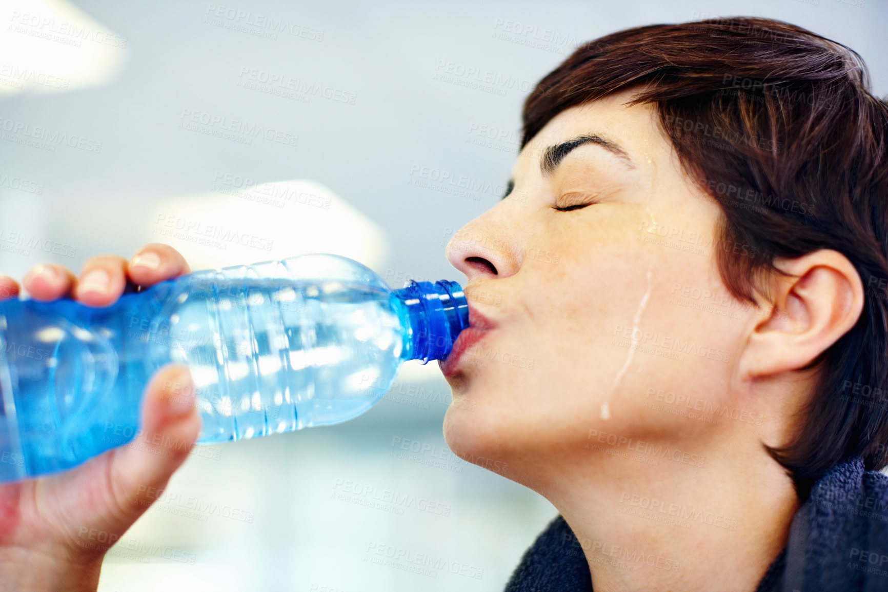 Buy stock photo Fitness, sweat or woman drinking water in gym for health, wellness or nutrition with face profile. Tired, liquid or thirsty athlete with bottle for hydration on break after exercise, sport or workout