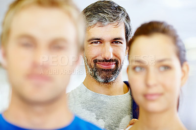 Buy stock photo Closeup of mature man with friends on foreground at fitness center