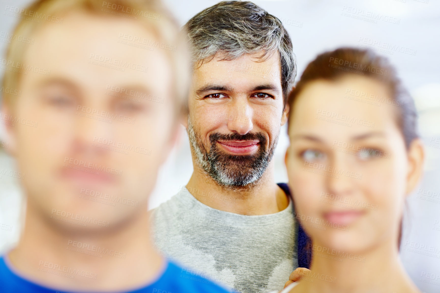 Buy stock photo Portrait, man and sweat in gym for workout, exercise or break as personal trainer in wellness center. People, fitness instructor and smile with clients for membership, subscription and health routine