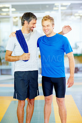 Buy stock photo Portrait of two male friends with arms around after fitness exercise