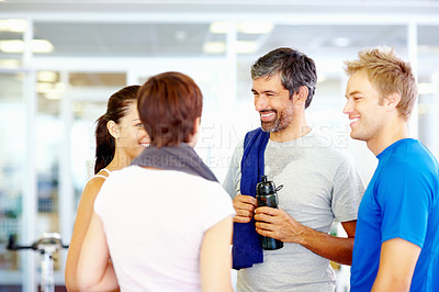 Buy stock photo Mature man conversing with friends after fitness exercise