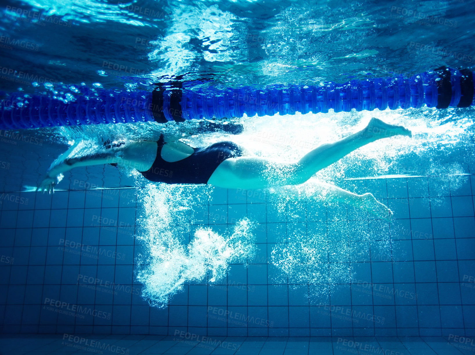 Buy stock photo Underwater, blue and person in swimming pool, athlete and training for competition, rope and fitness. Lines, clean and aquatic sports, recreational and liquid for race, exercise and arena for games