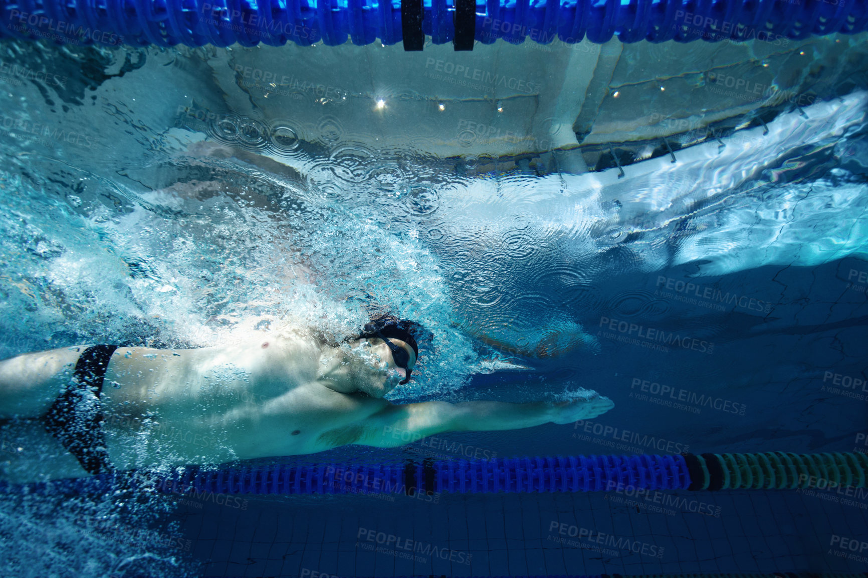 Buy stock photo Underwater, training and person in pool, swimming and cardio for competition, blue or race. Lines, clean and aquatic sports for exercise, recreational or liquid for athlete, rope or arena for fitness