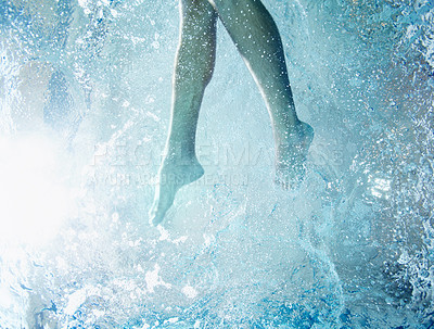 Buy stock photo Cropped view of a the legs of a male swimmer in a pool