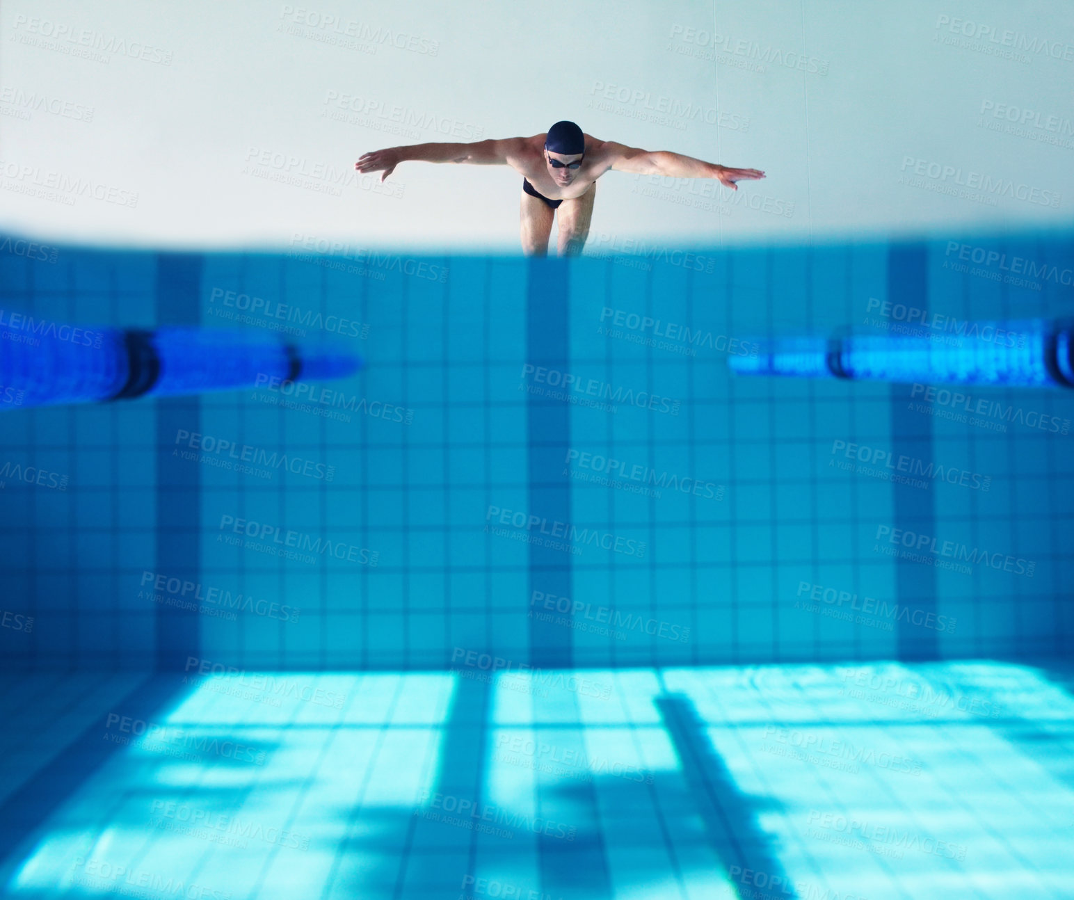 Buy stock photo Diver, water and person in pool, swimming and cardio for competition, blue and race. Mockup, clean and aquatic sports for exercise, recreational and liquid for athlete, space and arena for fitness