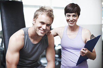 Buy stock photo Coach, clipboard and portrait of people in gym for fitness notes, support or healthy body in workout. Man, woman and personal trainer with checklist in session for exercise, help or tracking progress