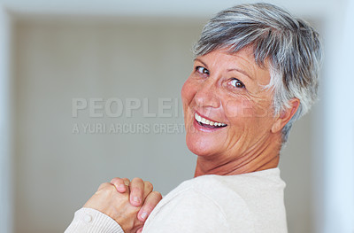 Buy stock photo Portrait of happy mature woman smiling with clasped hands