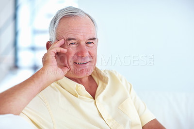 Buy stock photo Portrait of happy mature man smiling at home