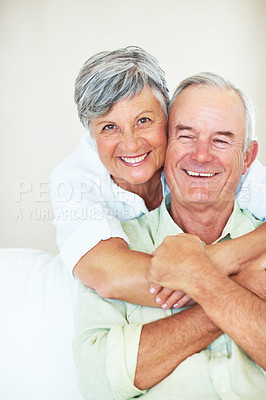 Buy stock photo Portrait of happy mature woman embracing handsome man at home