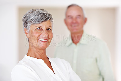 Buy stock photo Home, senior woman and happy in portrait for retirement, comfort and confidence with positive attitude. Elderly couple, female person and old man in marriage for commitment, connection and bonding