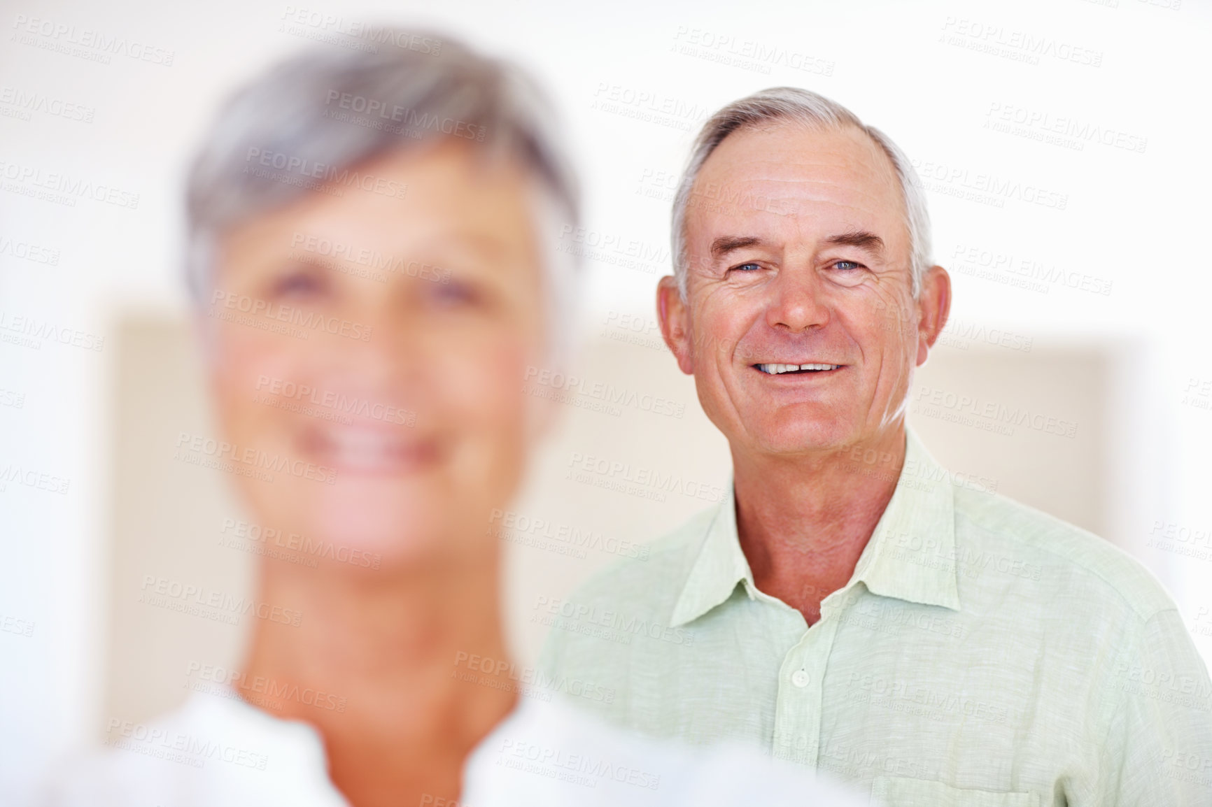 Buy stock photo Home, senior man and laughing in portrait for retirement, comfort and happiness with positive attitude. Elderly couple, male person and old woman in marriage for commitment, connection and bonding